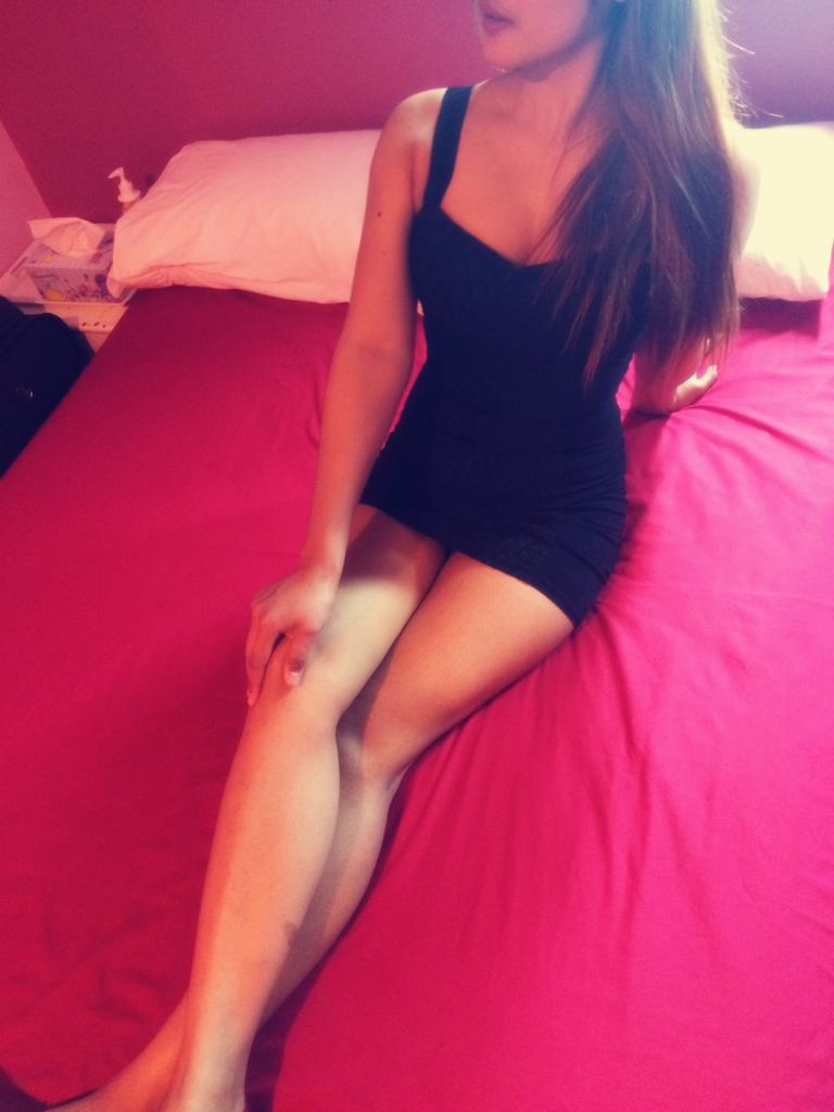 Brunette Escort in black dress