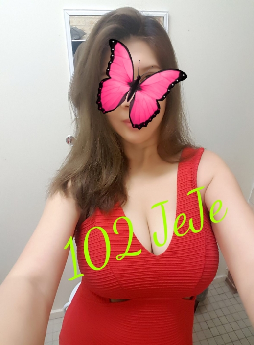 Mongolian escort big boobs wearing tight red dress