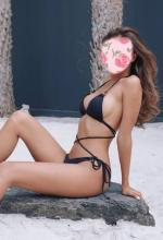 Sexy escort in black bikini