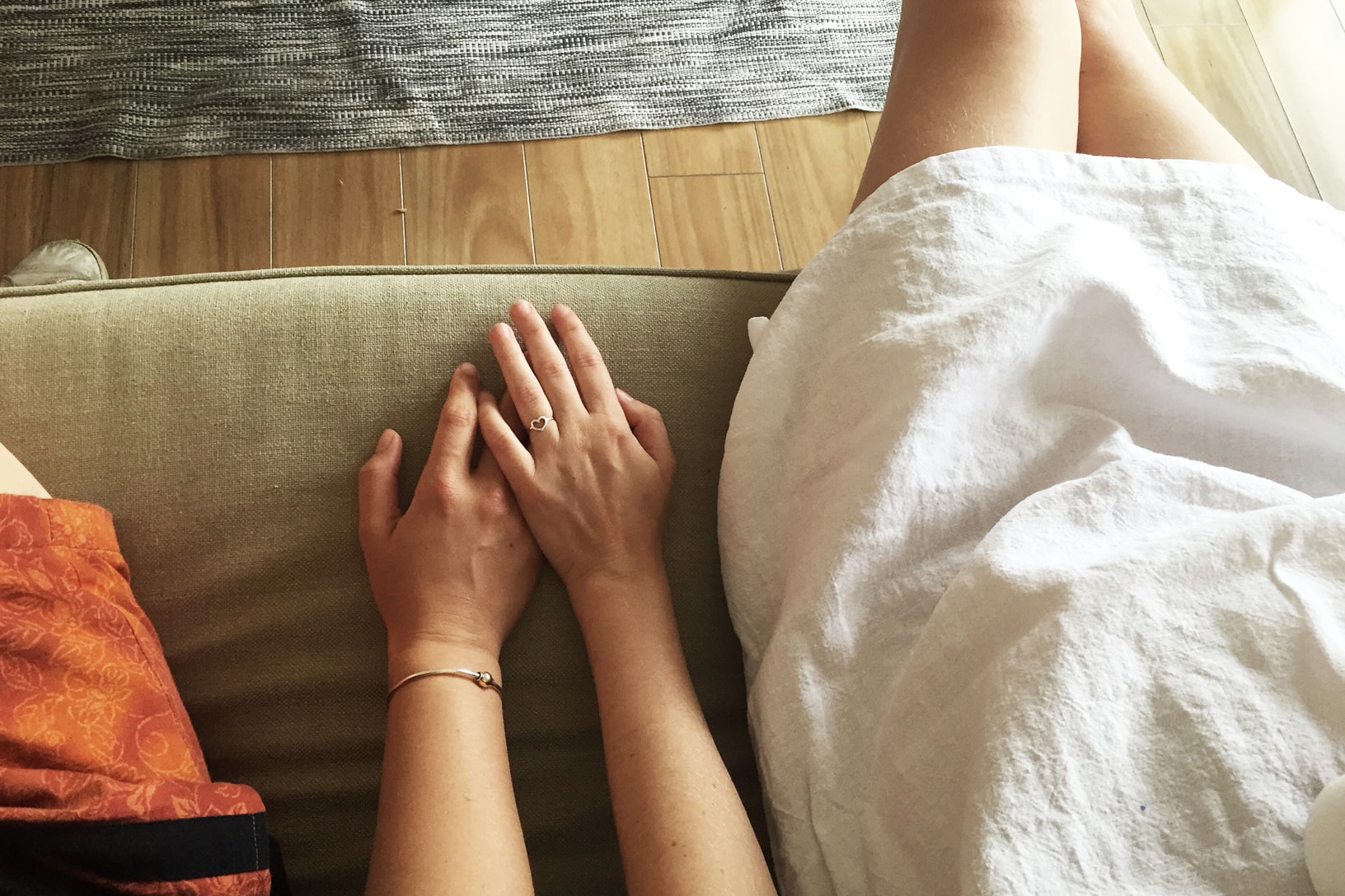 Aerial close up of 2 girls holding hands.jpg