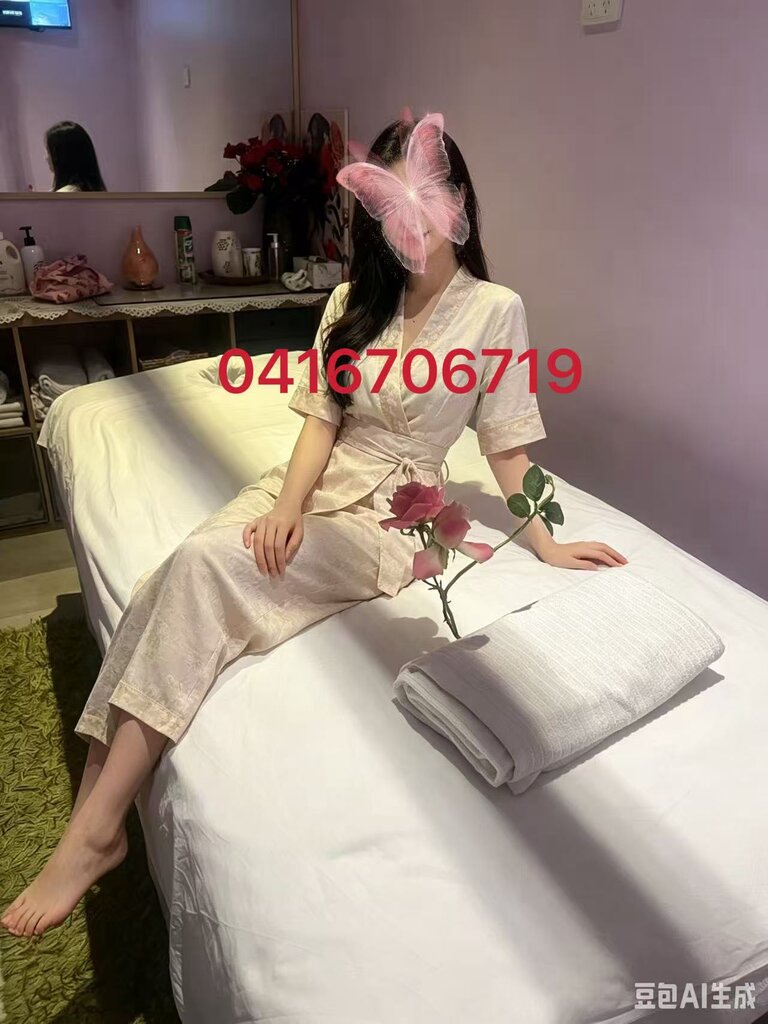 Anna with subi shop number.jpg
