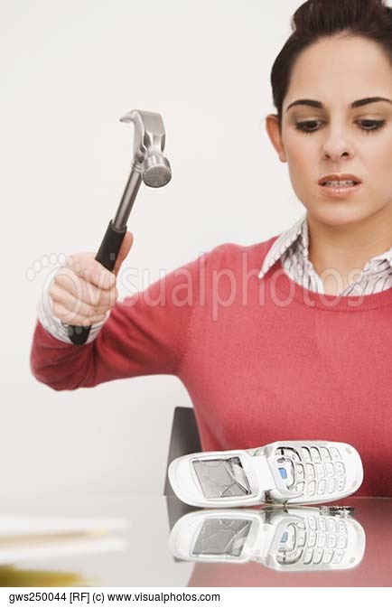 businesswoman-breaking-a-mobile-phone-with-a-hammer.jpg