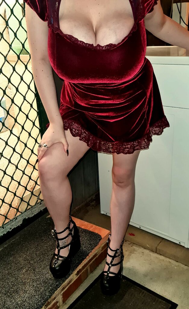 Busty Danni In Red Velvet Dress.jpg