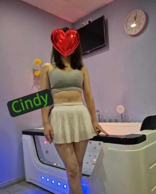 Cindy in front spa.jpg