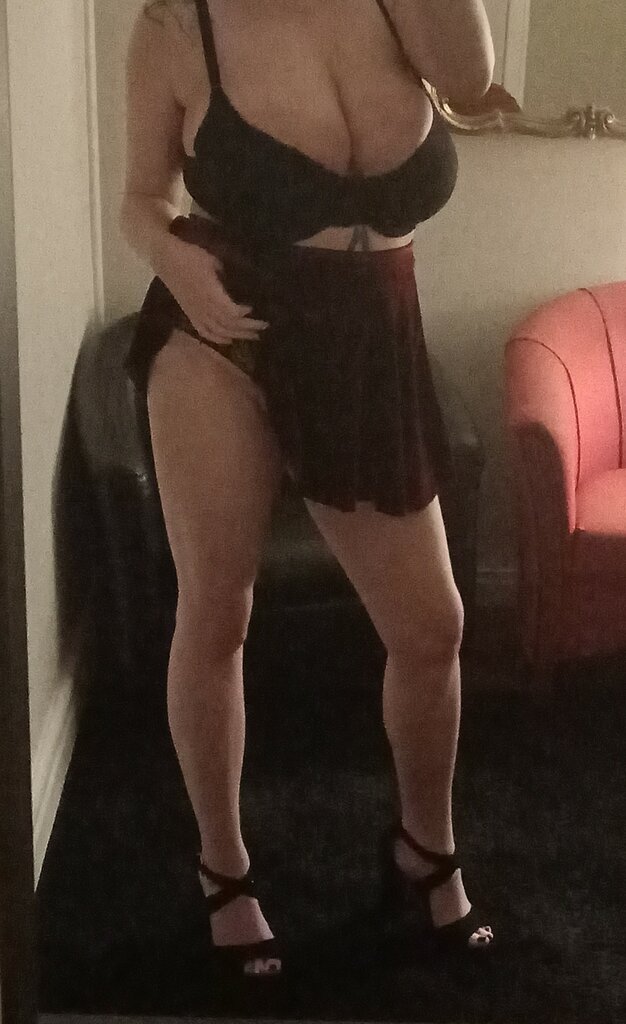 Danni leg peek in skirt.jpg