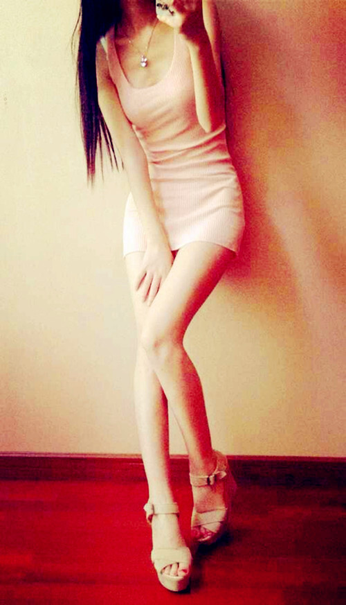Asian escort in pink dress