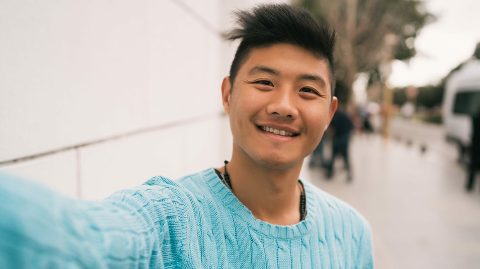 man-blue-sweater-selfie.jpg