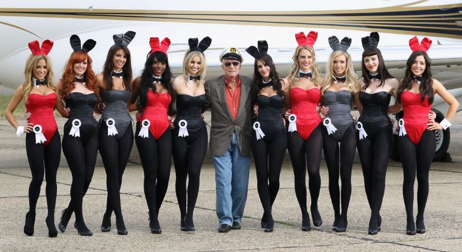 Sexy Ladies in bunny like outfit with man