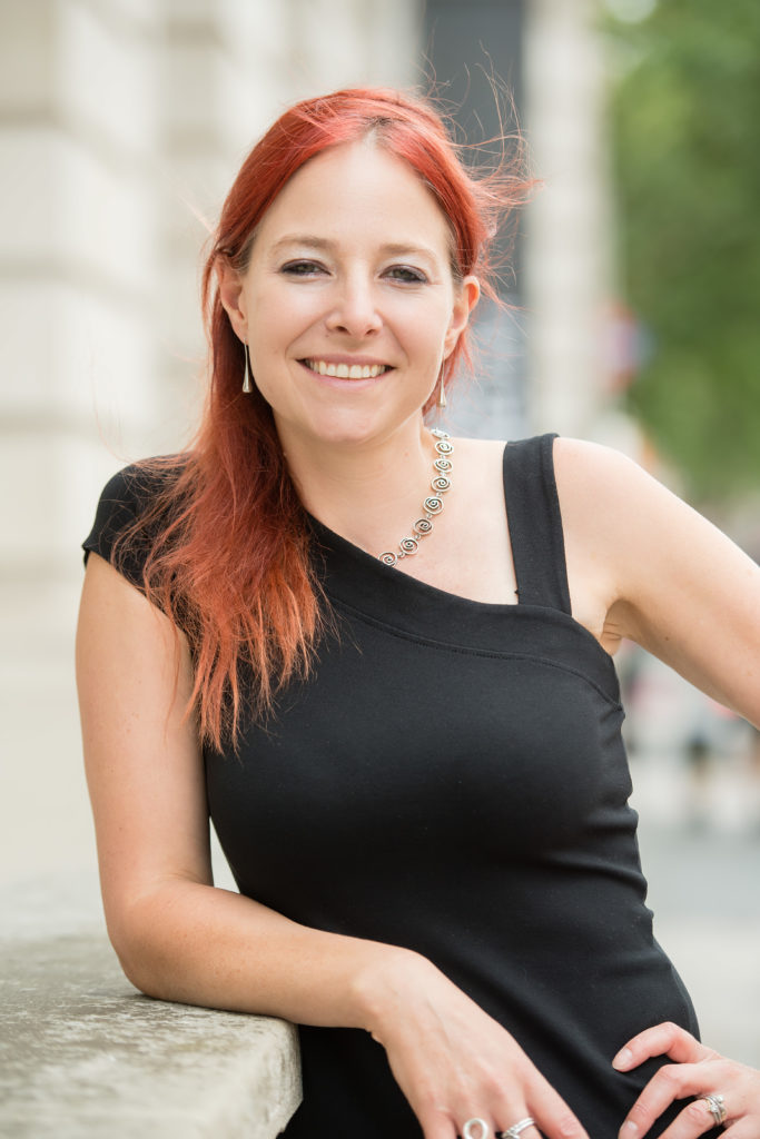 Prof Alice Roberts Outside_portrait_leaning-on-wall-683x1024.jpg