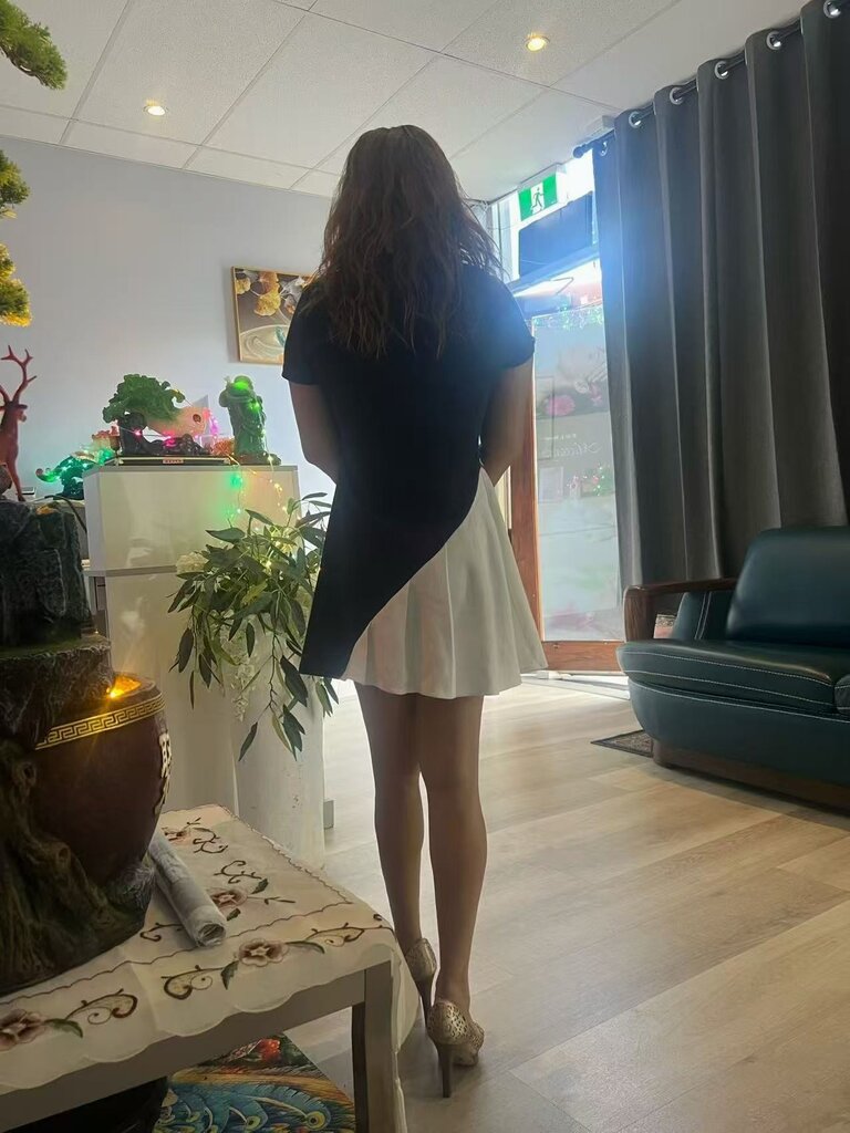 Renny front of shop.jpg