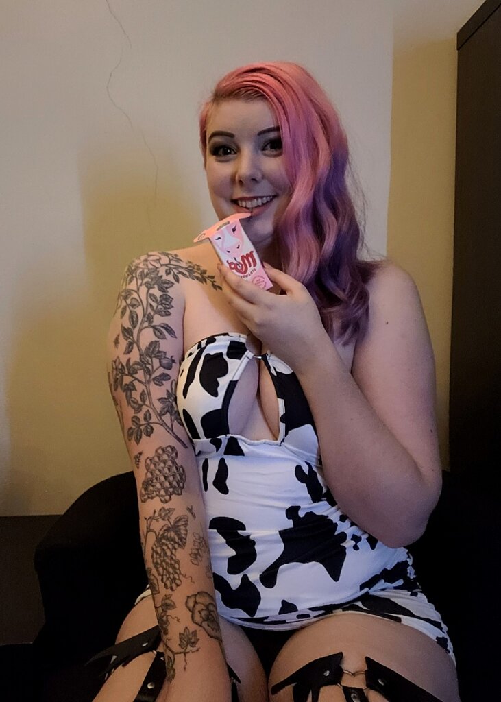 Sara cow print dress.jpg