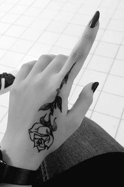 Small_Rose_Hand_Tattoo.jpg