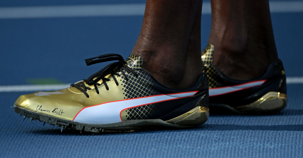 usain-bolt-gold-puma-spikes-olympics.jpg