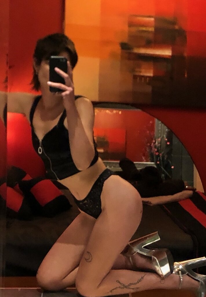 Violet sexy pose in mirror close up.jpg