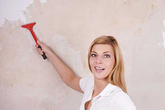 woman-removing-wallpaper.jpg