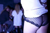 girl in black undies and white top dancing