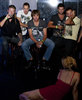 group of guys watching girl dancing