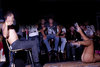 grouple of guys sitting on chairs