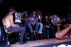 grouple of guys sitting on chairs