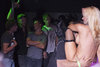group of guys in front of naked girl in stockings