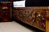 Victorian wood carving along the bed frame