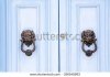 stock-photo-vintage-architecture-on-door-knobs-door-knobs-of-the-world-356549093.jpg